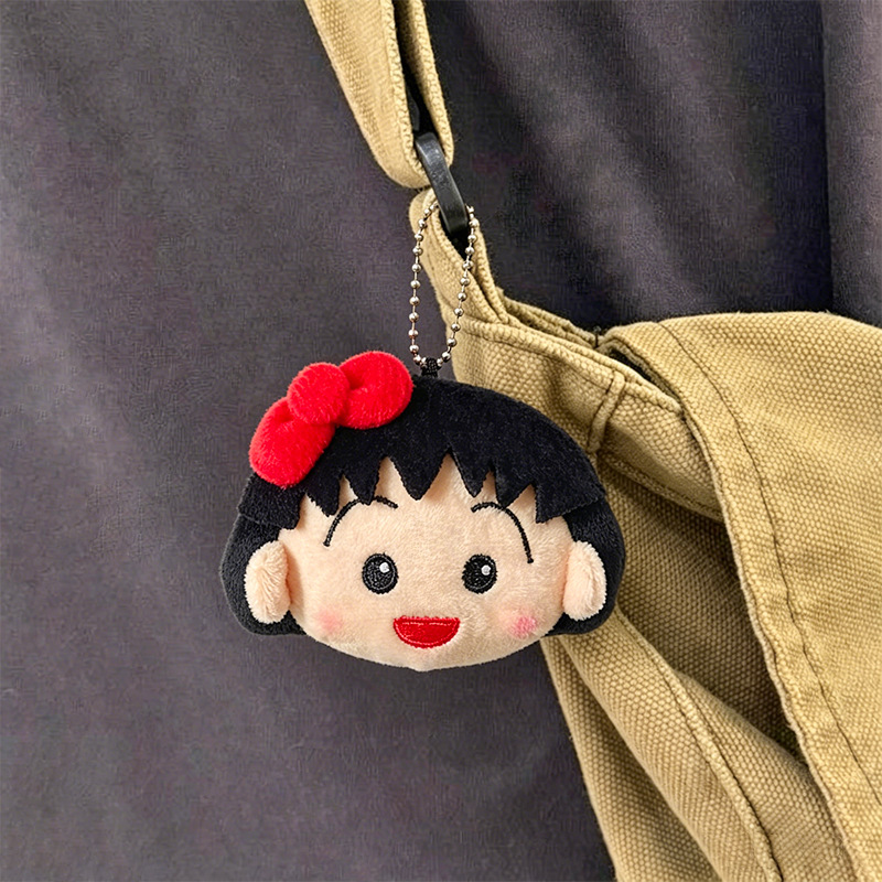 سلسلة مفاتيح لطيفة على شكل شخص - مراجعة Car Accessories Toy وسعره
